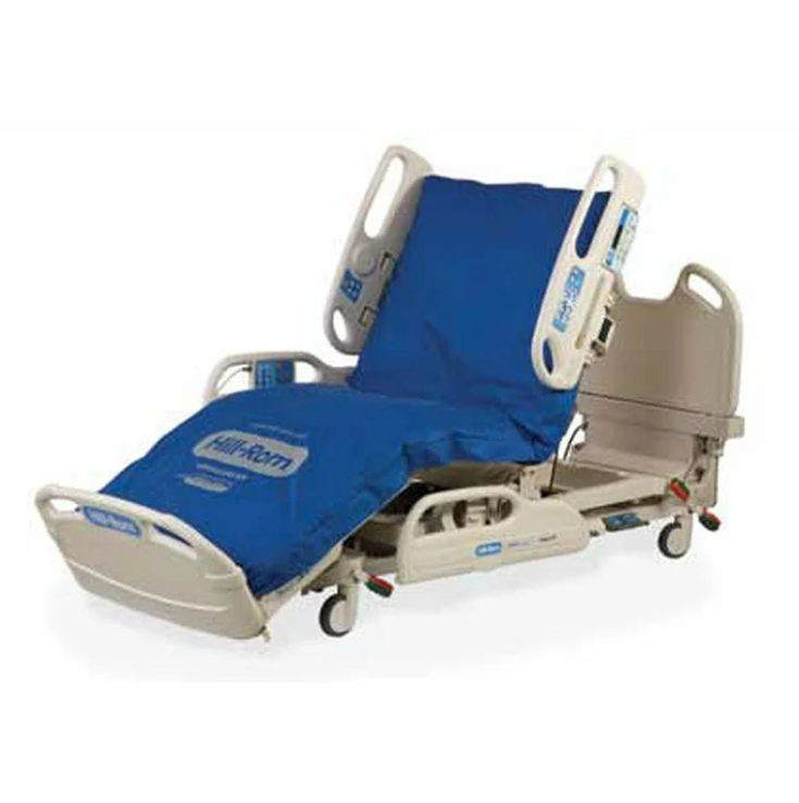 Hill Rom P3200 Versacare hospital bed with adjustable side rails and foam mattress for patient comfort and care.