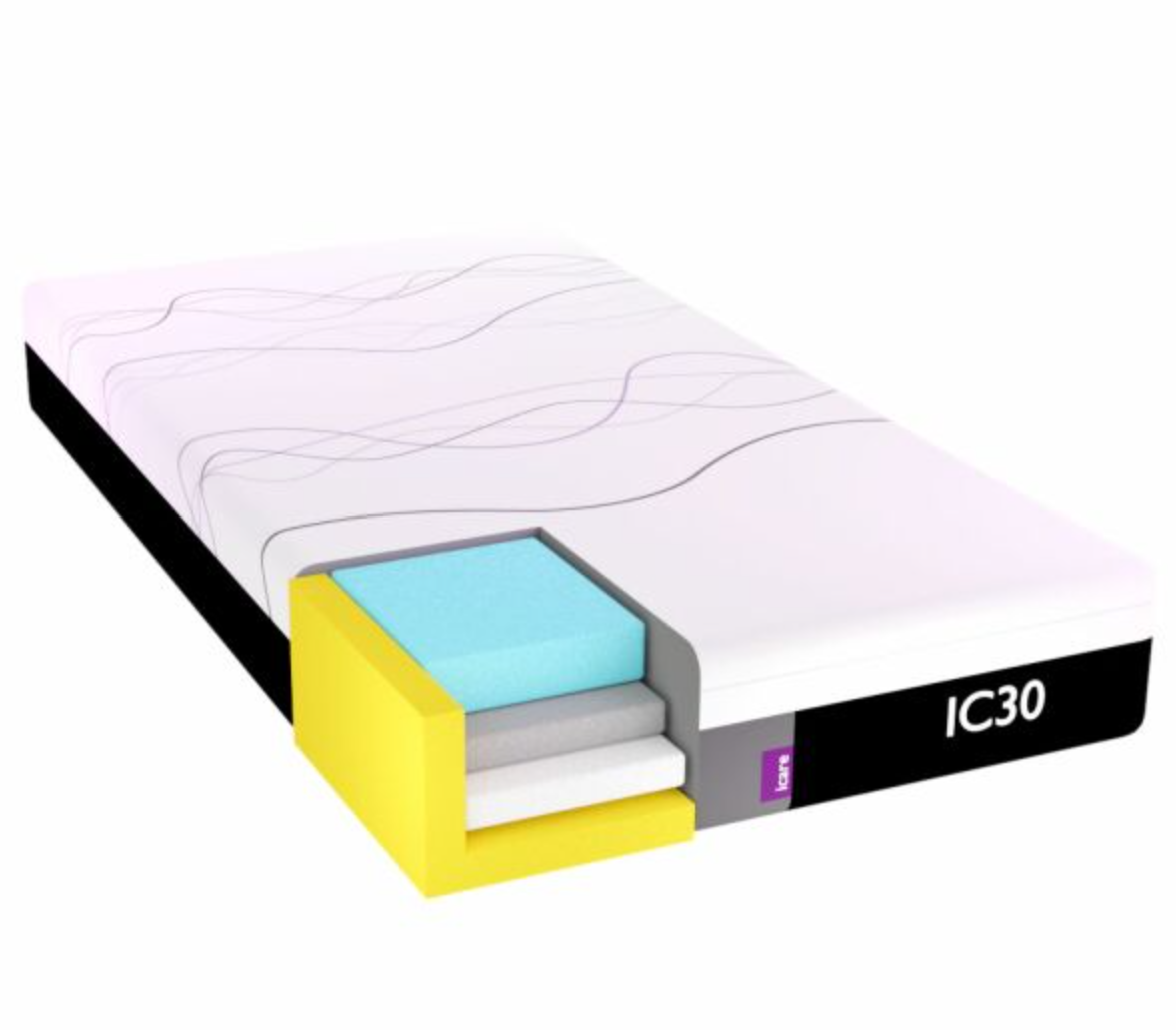 A 3D render of a mattress with a cutaway view showing its layered construction. The mattress has a white top surface with subtle wavy lines, a black side edge, and a yellow, gray, and white cross-section revealing different layers.